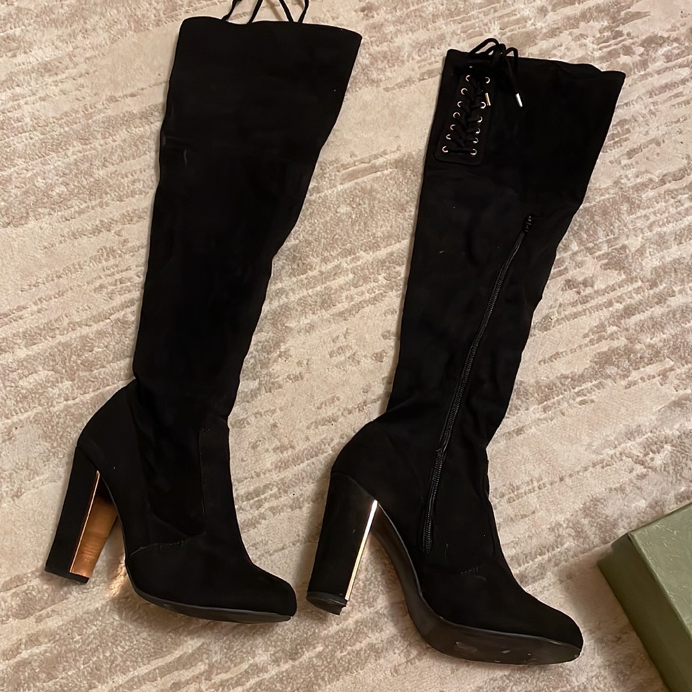 Thigh high heeled black suede boots size 7.5 runs small